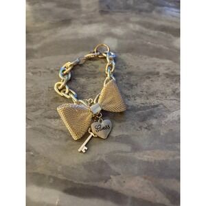 GUESS Gold Tone Bow Key Heart Charm Bracelet